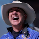 Jeff Bezos reportedly “laughing,” according to whoever took this photo.